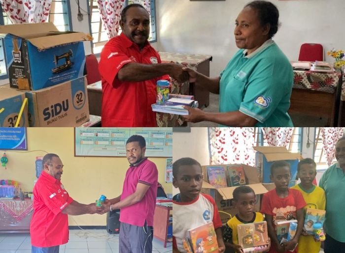 Ketua DPC Barisan Merah Putih Manokwari, Adrianus Mansim, menyerahkan bantuan paket buku dan alat tulis di sejumlah SD di Manokwari, Jumat 10 Oktober 2025